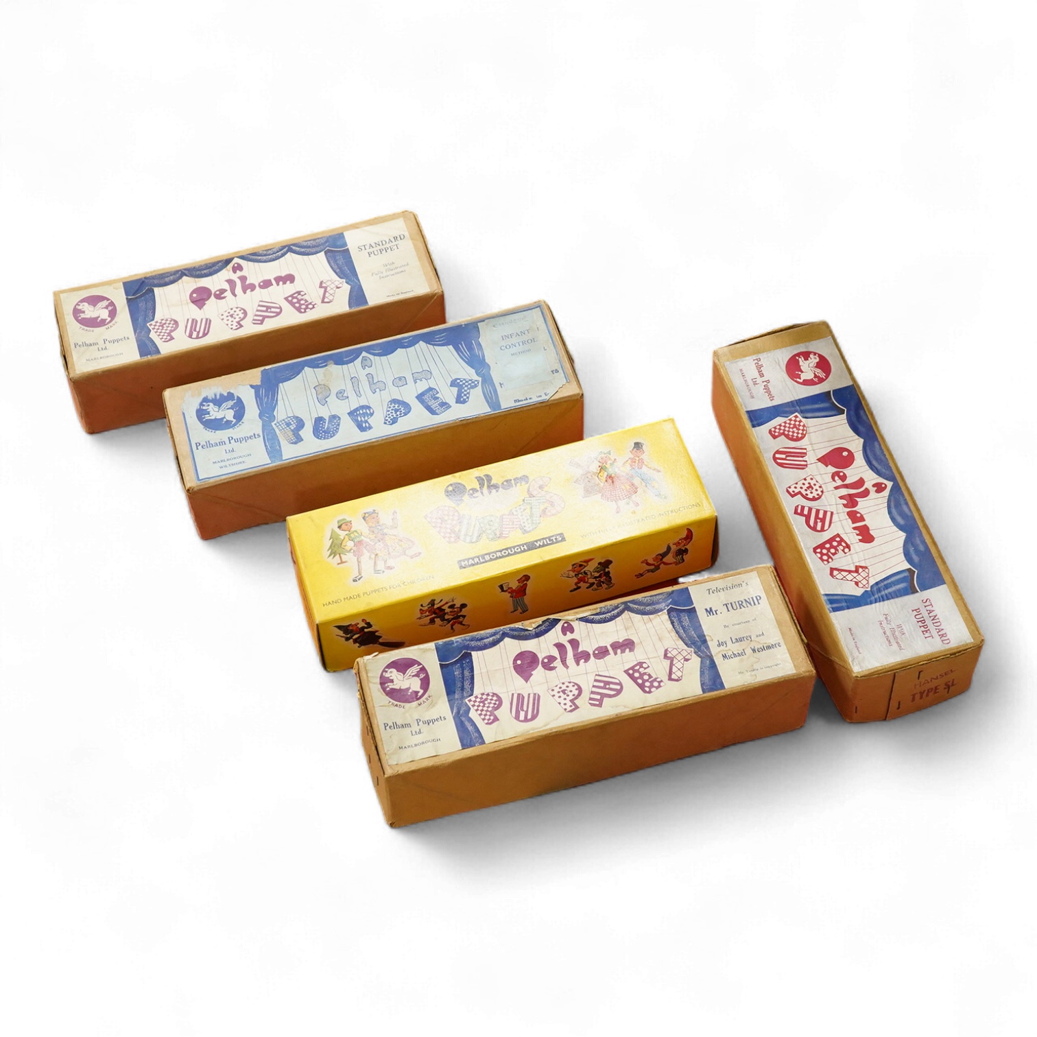 Five boxed Pelham Puppets including; a Type SL Hansel, Gretel, Bembo the Clown, the Policeman with moving mouth, Mr. Turnip